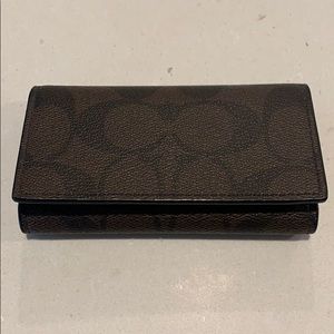 Coach four ring key case